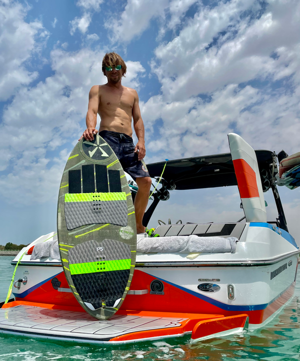 Wakesurfing on Phase 5 boards behind the Malibu near Yas Island