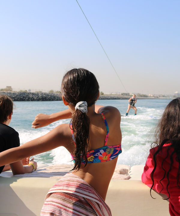 Child riding a wakeboard with Eywoa at Yas Marina Abu Dhabi