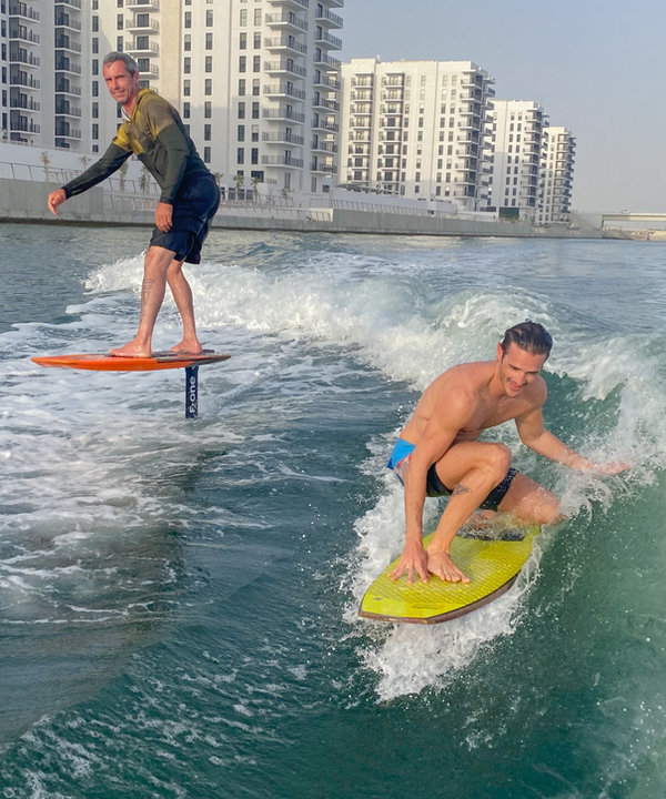 Wakesurfing and wakefoiling riders share the Malibu wave