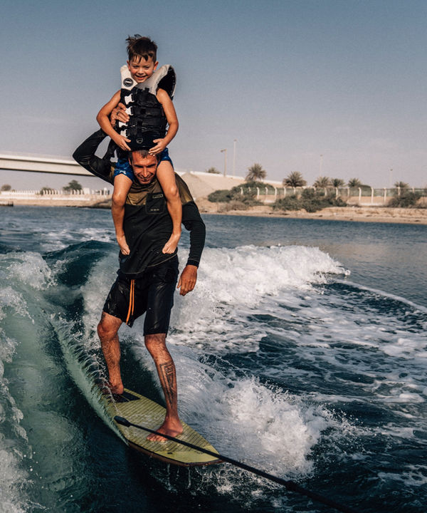 Kids wakesurfing with Eywoa near Yas Marina Abu Dhabi
